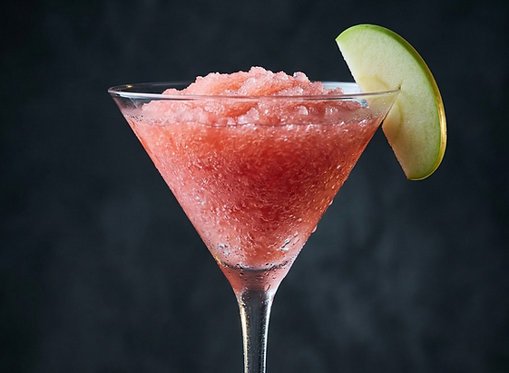 A wickedly delicious, vivid green apple slush packing a crisp, tart punch. The striking neon hue and bold, tangy flavor profile make it a standout choice that draws the eye and delivers an unforgettable taste experience.