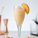 A sun-kissed, golden slush bursting with the sweet, juicy essence of ripe summer peaches. Its bright, inviting color and smooth consistency make it a highly photogenic and universally appealing choice for direct-to-consumer orders and wholesale partners