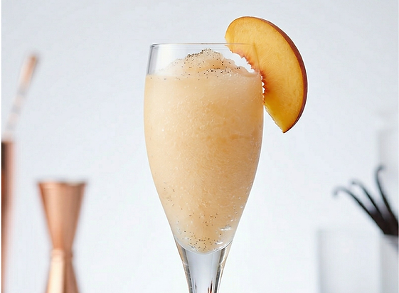 A sun-kissed, golden slush bursting with the sweet, juicy essence of ripe summer peaches. Its bright, inviting color and smooth consistency make it a highly photogenic and universally appealing choice for direct-to-consumer orders and wholesale partners